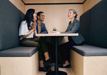 Poster - Making the wise choice and hiring a financial advisor. Full length shot of an affectionate young couple meeting with their mature female financial advisor.