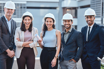 Poster - Well take your ideas to the next level. Shot of a group of businesspeople wearing hardhats while standing outside.