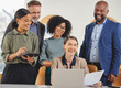 © Delcio F/peopleimages.com - Their synergy as a team is simply amazing. Shot of a group of businesspeople working together on a laptop in an office.