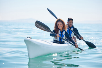 Poster - We row together, we grow together. Portrait of a young couple kayaking together at a lake.