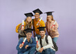 © Studio Romantic - Group of happy diverse mixed race multiethnic students with backpacks, in mortarboard graduate hats holding diploma scrolls, looking at camera and smiling. University education and graduation concept