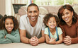 © Siphosethu F/peopleimages.com - A house isnt a home without the ones you love. Shot of a young family relaxing at home.