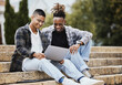 © Siphosethu Fanti/peopleimages.com - Work hard now so you can play hard later. Shot of two young men using a laptop on campus.