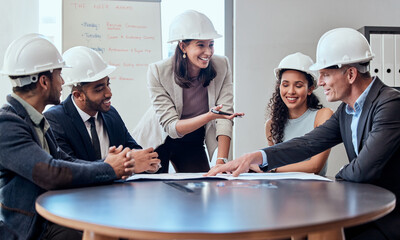 Aufkleber - I really like that idea. Shot of a group of architects brainstorming in an office.