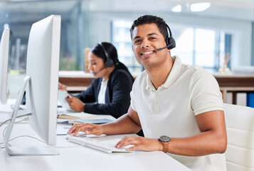 Wall Mural - were the problem solvers of the company. shot of two young businesspeople sitting in the office toge