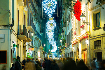 Wall Mural - Photo of streets of Barcelona in evening during christmas time.