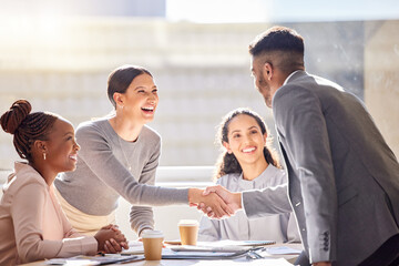 Poster - Its going to be an honour to work with you. Shot of two businesspeople shaking hands during a meeting in an office.