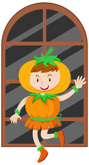 Canvas Print - A girl wearing pumpkin costume for halloween