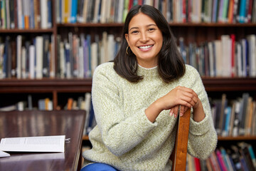 Poster - Be the boss. Shot of a young woman studying in a college library.