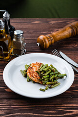 Wall Mural - fried chicken with asparagus close up