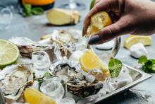 Fresh Oysters With Lemon And Ice. Restaurant Delicacy. Oysters Dish. Oyster Dinner With Champagne In Restaurant, Banner, Menu, Recipe Place For Text, Top View