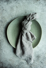 Overhead view of a napkin on a plate