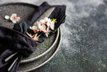 Close-Up Of A Festive Springtime Place Setting With Cherry Blossom Flowers