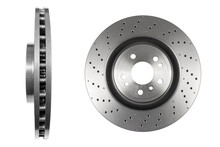 Car Brake Disc Isolated On White Background. Auto Spare Parts. Perforated Brake Disc Rotor Isolated On White. Braking Ventilated Discs. Quality Spare Parts For Car Service Or Maintenance