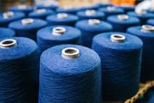 Cotton Yarns Or Threads On Spool Tube Bobbins At Cotton Yarn Factory.