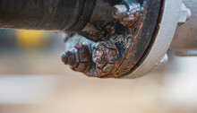 Rust Damage Paint And Corrosion Flange And Bolt Nut On Pipeline