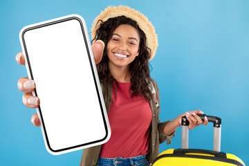 Poster - African American Tourist Woman Showing Phone Screen Over Blue Background