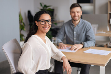 Poster - Happy HR manager and successful vacancy applicant posing and smiling at camera during job interview at office