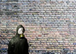 Gas mask. Man wearing a gas mask and the wall behind him with copy space.