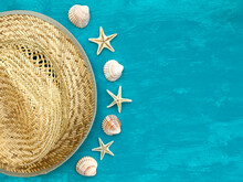 Straw Hat, Seashells And Seafish On Aquamarine Background, Top View