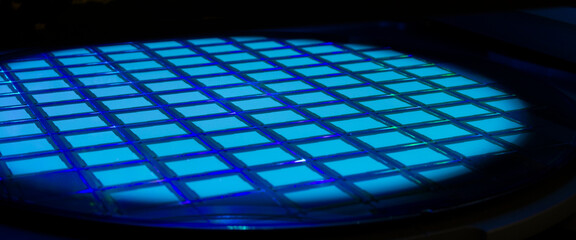 Poster - Silicon wafer with chips in UV lighting. Neon. Ultraviolet Lithography.