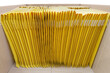 Bunch of yellow padded envelopes in a shipping box