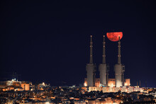 Blood Moon Over The Three Chimneys Of The Sant Adrià Del Besòs Thermal Power Plant (Barcelona, Spain)