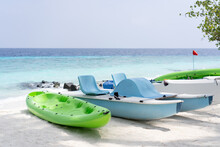 Catamarans And Canoes For Rent On The Beach In The Maldives