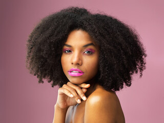 Wall Mural - Give yourself the gift of confidence. Studio shot of an attractive young woman posing against a pink background.