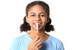 African-American teenage girl brushing teeth on white background