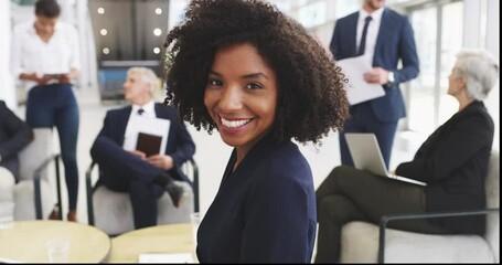 Poster - shes everywhere where success is in the making. 4k video footage of a young businesswoman smiling in