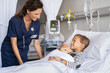 © Rido - Nurse caring cute little boy patient at hospital