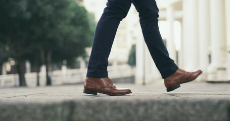 Canvas Print - Walk to discover. 4k video footage of an unrecognizable businessman walking in the city.