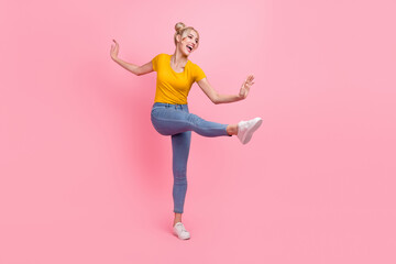 Sticker - Full body photo of cool young blond lady dance wear t-shirt jeans sneakers isolated on pink color background