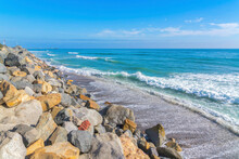 Rock Seawall At San Clemente, California With Blue Ocean View
