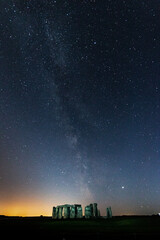 Sticker - Vertical shot of the Stonehenge and the beautiful Milky Way in the background in Wiltshire, The UK