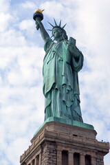 Wall Mural - Vertical shot of the Statue of Liberty in New York City, in the United States