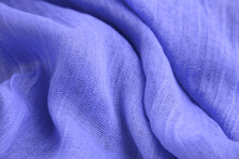 Textile Texture With Waves Close-up. Fabric Tinted In Very Peri Color, Trendy Purple Lilac Woven Background For Design