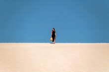 Traveler Walking In Desert
