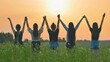 © Довидович Михаил - Girls friends raise their hands at sunset.