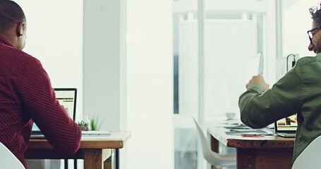 Aufkleber - The two of us will make history. Two handsome multi ethnic happy diverse confident young business men fist bumping in celebration while working on their computers at desks in a modern creative office