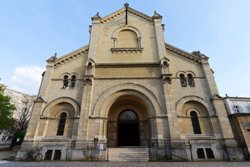 Wall Mural - Nearby the Montparnasse Tower, in the district of Plaisance in 14th district of Paris , is one of the most unusual churches of Paris : Notre-Dame-du-Travail Church.