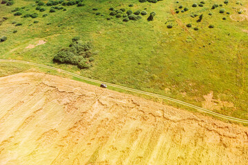 Wall Mural - Aerial View Of Car SUV Parked Near Countryside Road In Summer Field Rural Landscape. Yellow Wheat Field In Summer Season.
