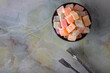 Traditional Turkish delight in a bowl on marble background	