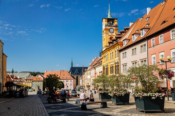 Cheb, Western Bohemia, Czech Republic, 14 August 2021: King George of Podebrady Square, Eger at sunny day, medieval colorful gothic historic renaissance and baroque buildings, town hall with tower