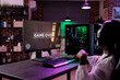 © DC Studio - African american player losing video games competition, live streaming online gameplay. Young woman playing action game tournament and feeling disappointed about lost gameplay.
