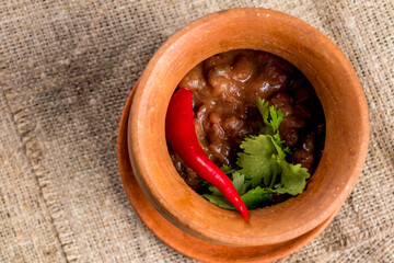 Sticker - bean lobio in a pot, georgian cuisine top view