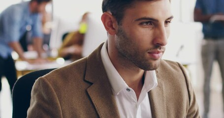Poster - Dedication is a good quality to have in a worker. Handsome focused young business man working hard on his computer alone at his desk in modern office. Confident businessman working on his desktop