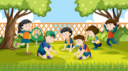 Wall Mural - children playing jack stones at the park