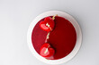 Red mirror half glazed and velor entremets with mini hearts and gold.